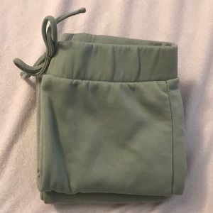 green sweatpants